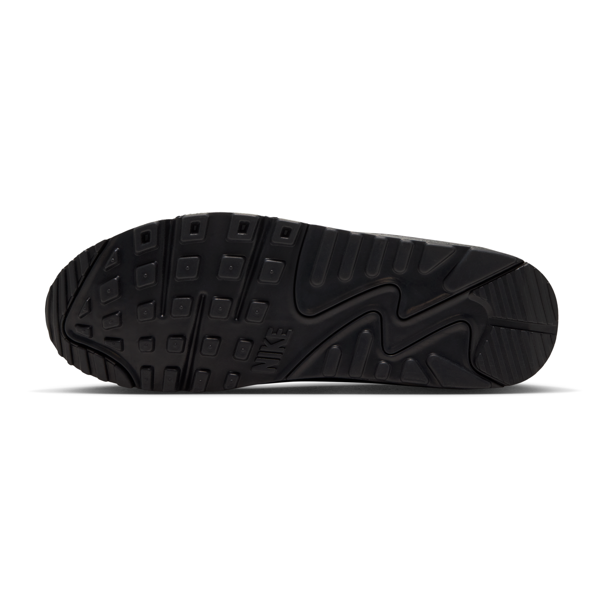 The black rubber outsole of a Nike sneaker, showing detailed tread patterns and the embossed Nike logo, photographed on a clean white background.